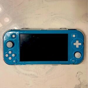Nintendo Switch Lite- Teal w/clear protector case and zip case-Charger included.